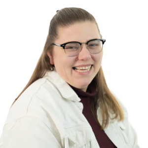 Smiling woman with long hair on a green background.